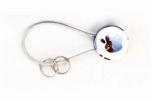 porte clé laniere apple blanc